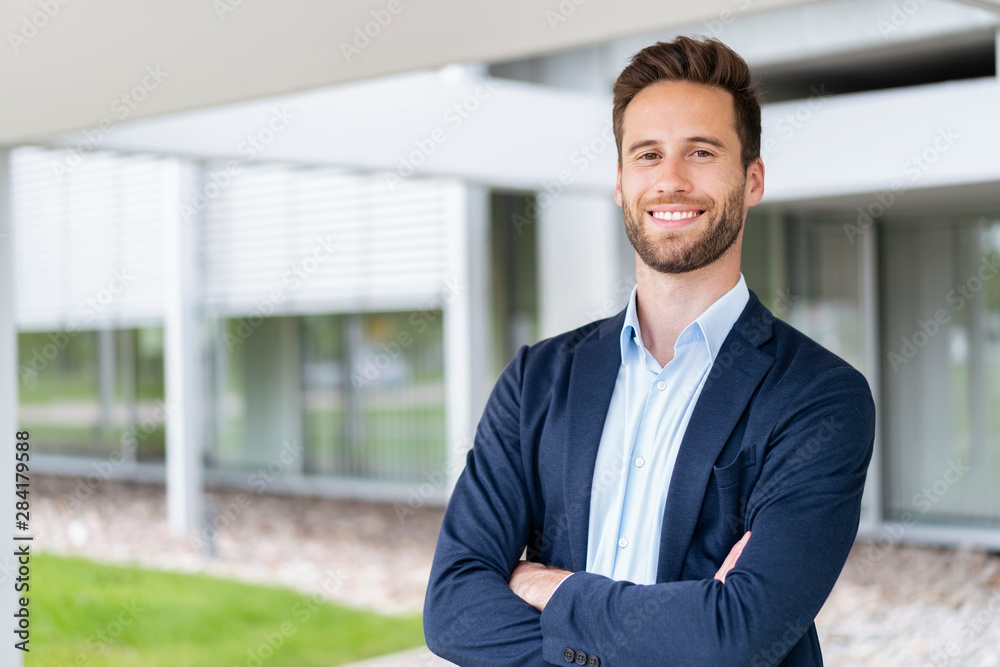 Portrait of smiling businessman outdoors Portrait of smiling businessman outdoors