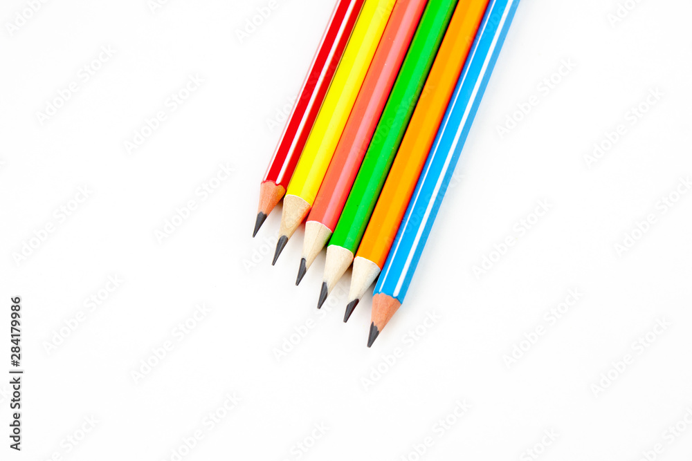 colored pencils in the shape of a star on a white background colored pencils in the shape of a star on a white background