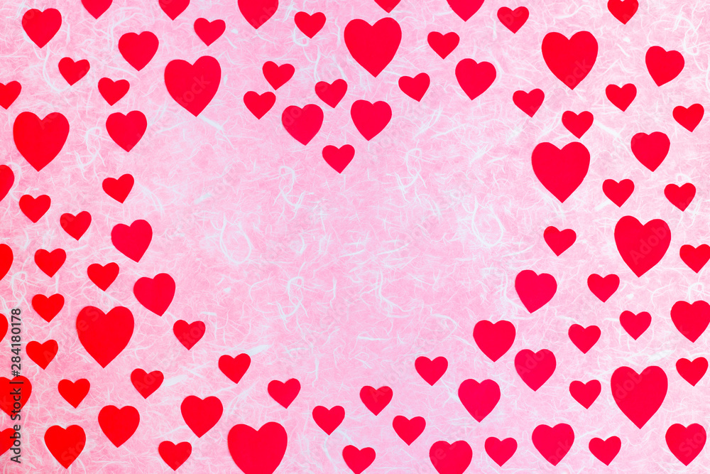 Valentine's Day concept. Red heart paper on pink and white background. Top view with copy space.