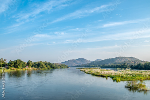 Landscape of mountain, tree, grass and the river background