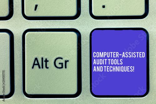 Text sign showing Computer Assisted Audit Tools And Techniques. Conceptual photo Modern auditing applications Keyboard key Intention to create computer message, pressing keypad idea photo