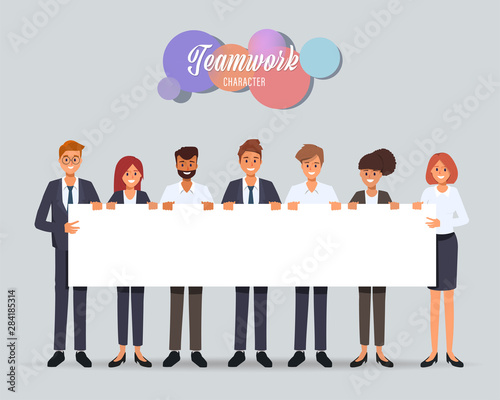 Group of business people teamwork holding big banner blank space character.