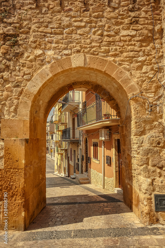 Ancient door in Butera photo