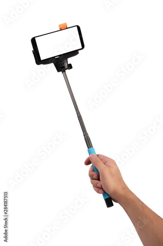 Smart phone with selfie stick in hand