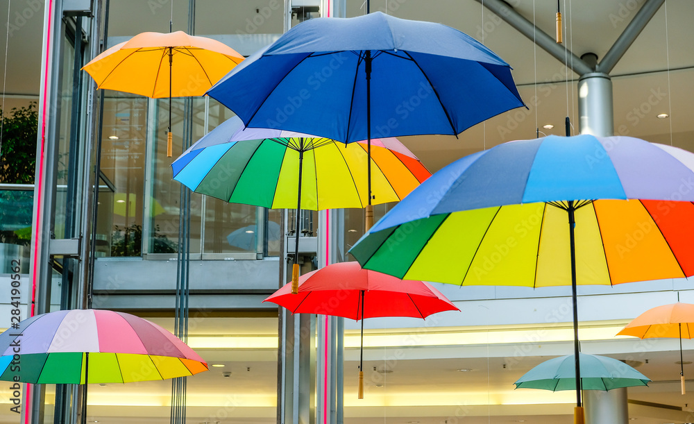 custom made wallpaper toronto digitalA ceiling in a mall with colorful umbrellas instead of blankets. Yellow, red, pink, blue, green, orange and colorful. Sunlight comes from above through the glass steel ceiling