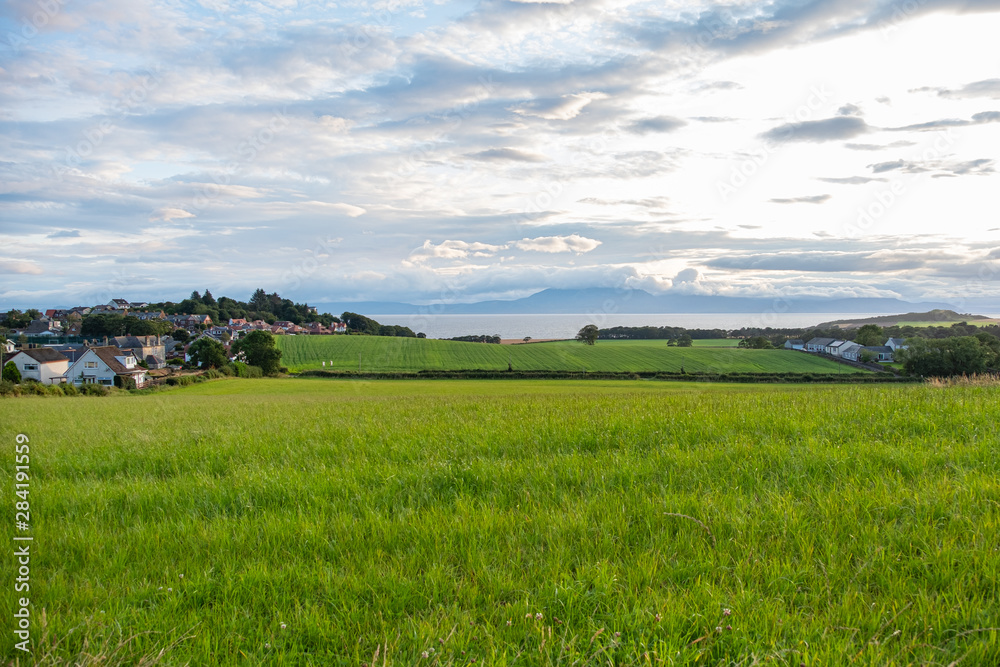 Ayrshire Fields of West Kilbride and Seamill over to a very Cloud Covered Arran on the West Coast of Scotland