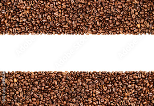 Two strips of coffee beans with white background in between © Samiylenko