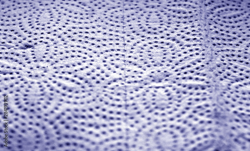 Paper towel surface with blur effect in blue color.