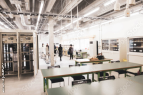 Abstract blurred image of Scientists working in the lab with bokeh for background usage.