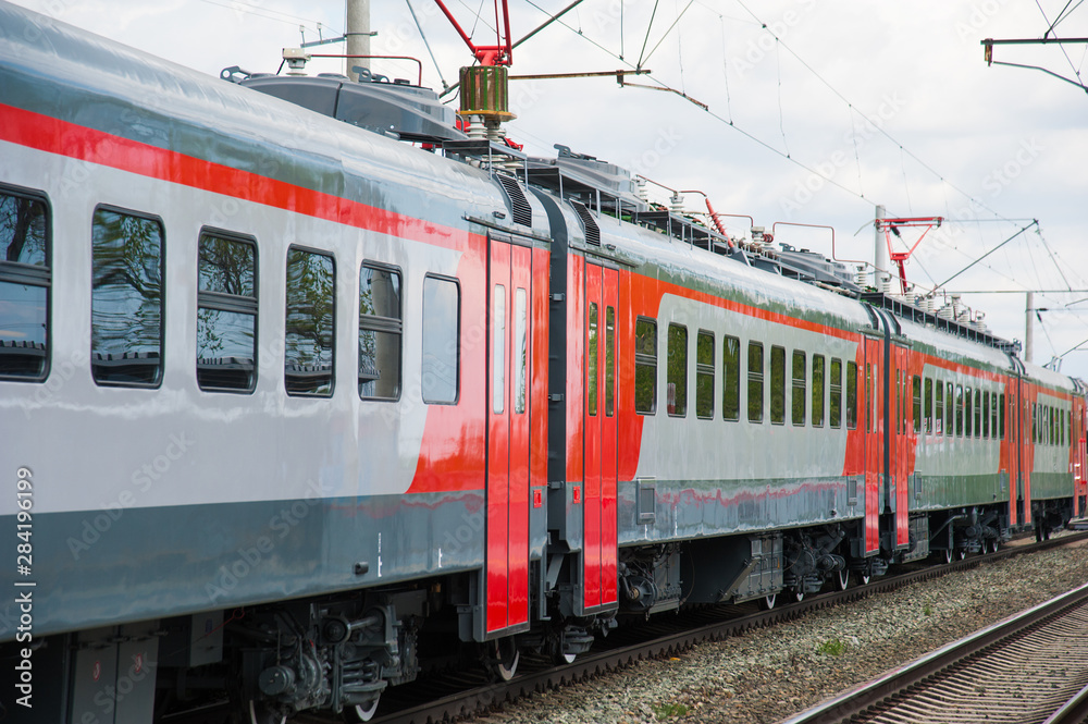 Red train in modern railway