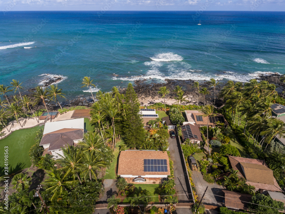 Aerial view of Oceanfront homes on the north shore of Oahu Hawaii