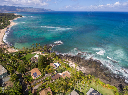 Aerial view of Oceanfront homes on the north shore of Oahu Hawaii photo