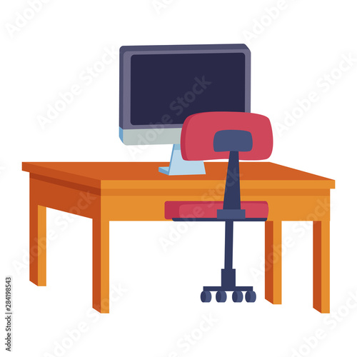 computer on desk with office chair