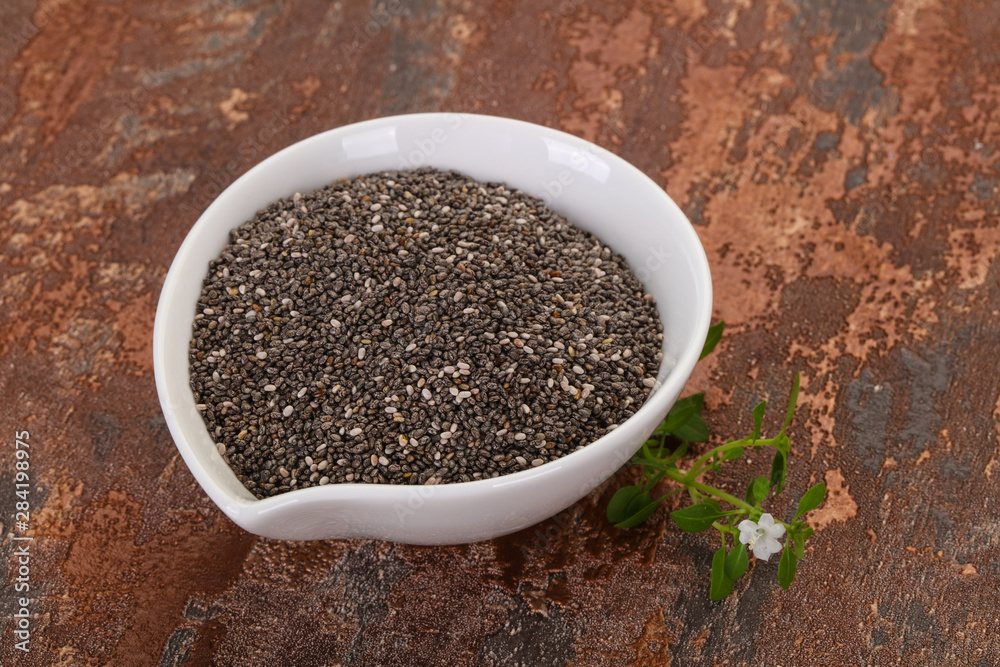 Dietary Chia seeds in the bowl Dietary Chia seeds in the bowl