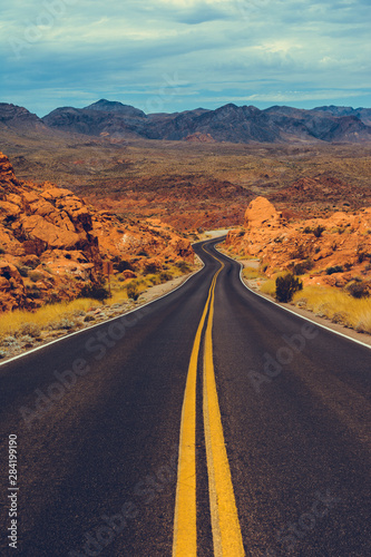 Bild auf Leinwand Classic american southwest road during a road trip to famous national parks - Sc