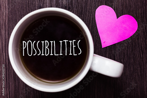 Handwriting text Possibilities. Concept meaning Things that may happen or be the case State of being possible Mug coffee lovely thoughts ideas love hart romantic memories brown wood photo