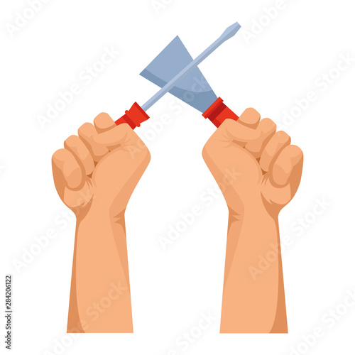 Construction workers hands holding tools