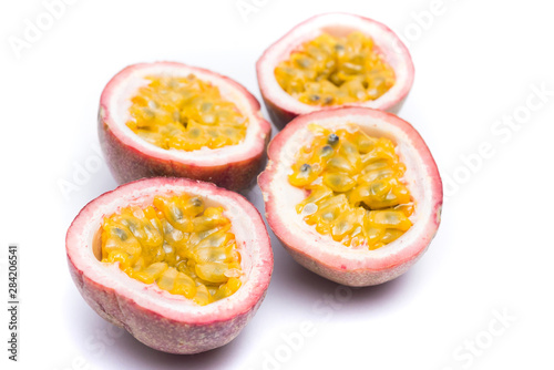Half cut passion fruit isolated on white background, sour fruit, fruit background, healthy food
