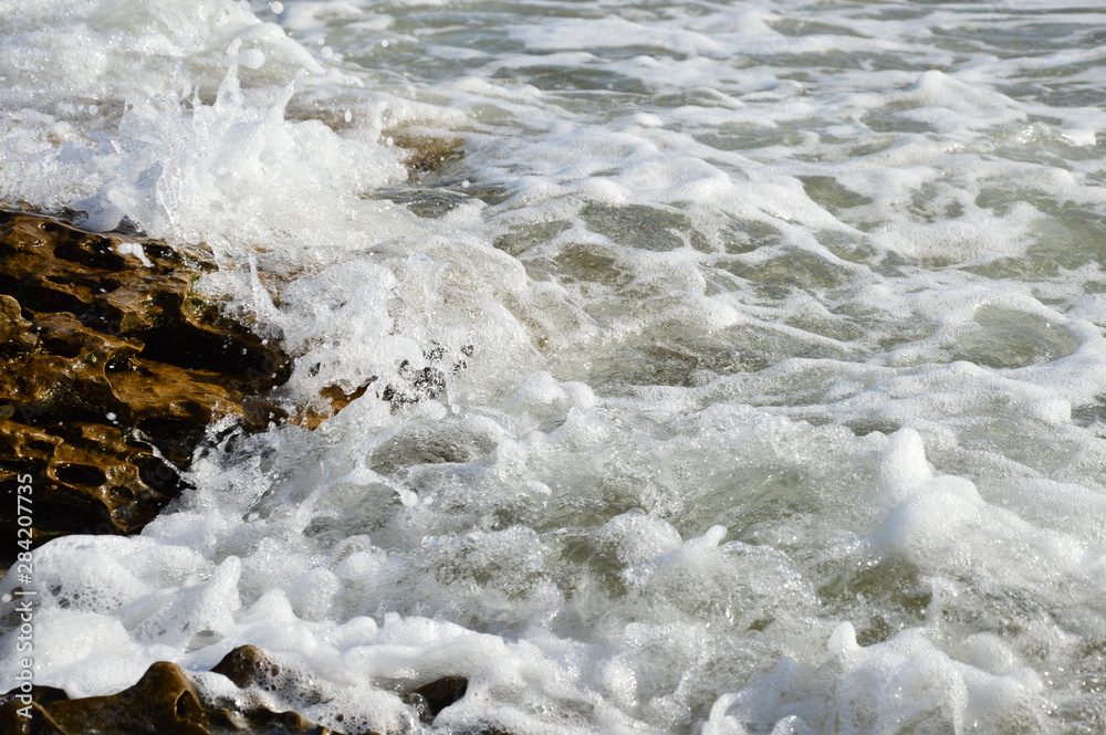 Black sea waves on the rock