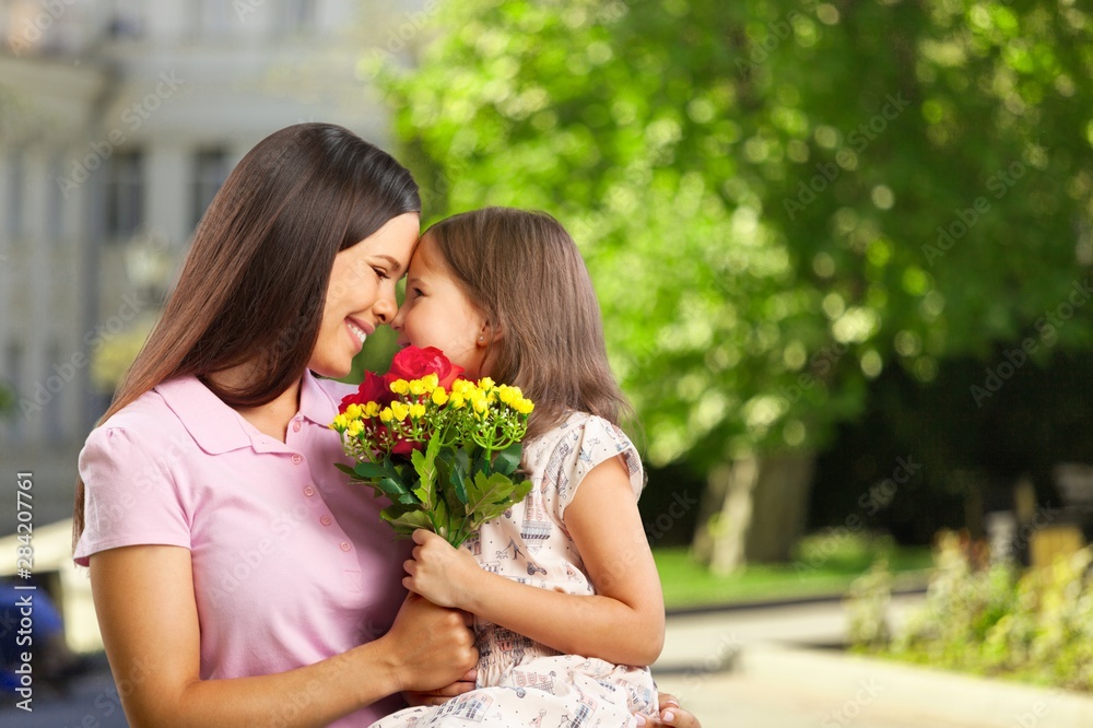 Happy Mother and daughter hugging Happy Mother and daughter hugging