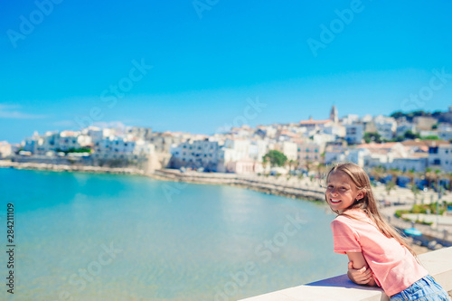 Adorable little girl in european city outdoors © travnikovstudio