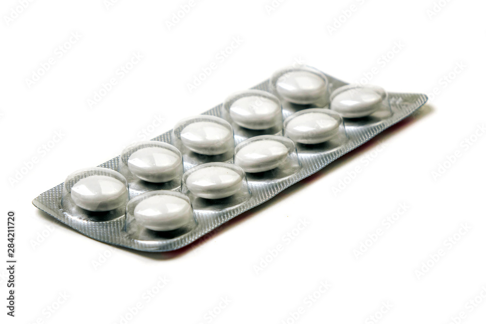white tablets in a package isolated on a white background white tablets in a package isolated on a white background