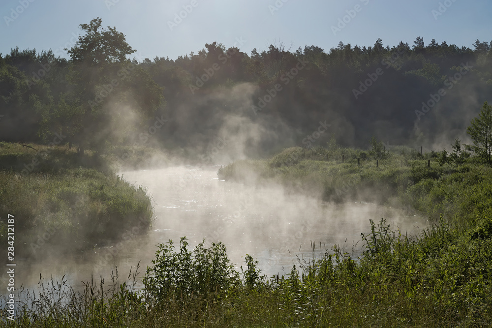 Morning fogs over the Warmian River