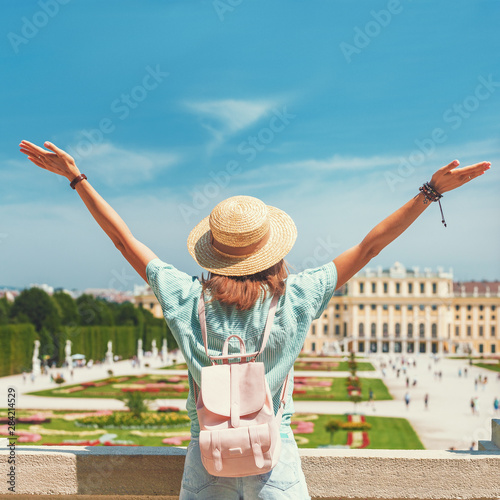Happy young asian woman travel in Schoenbrunn royal palace garden. Travel and tourism in Vienna and Austria