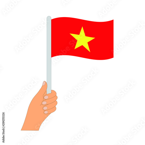 Flag of Vietnam  . Hand holding a Vietnam  flag - vector icon. © veronchick84