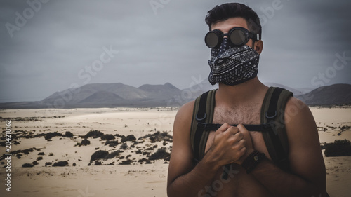 Desert man with handkerchief on his face and sand goggles. Halloween  concept. Stock Photo | Adobe Stock