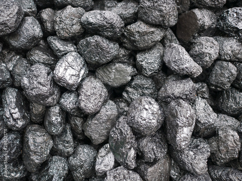 Closeup of mineral coal fossil fuel ready for the furnace photo