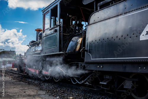 Train at the station waiting for passengers - former steam locomotive in Minas Gerais, train ride between the cities of Tiradentes and Sao Joao del Rei photo