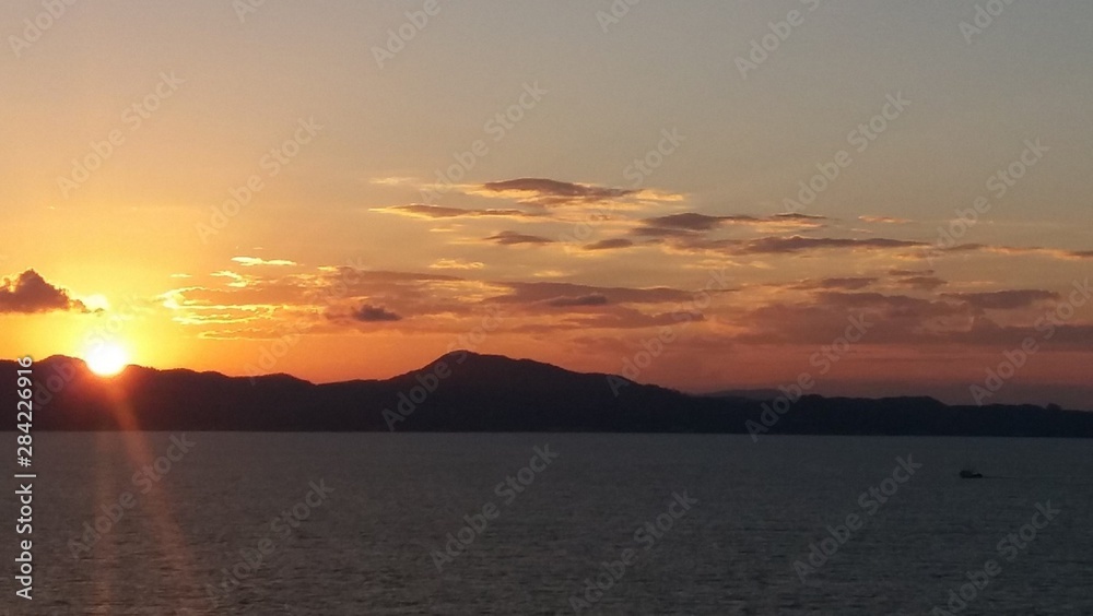Sunset over the sea and the mountains - Santa Catarina Coast - Brazil