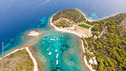 Budikovac Island off the island of Vis in Croatia where all the yachts park during the day during yacht week photo