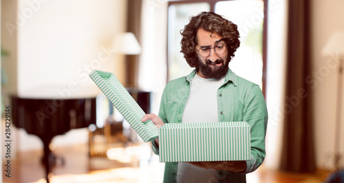 young fool man with a gift box