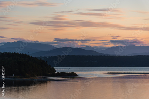 Sunset over mountains and water outside Port Townshend, Washington state