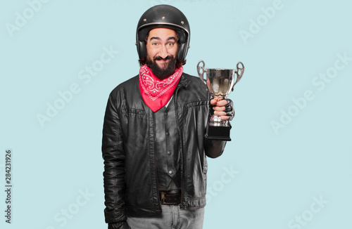 motorbike rider winnig a trophy photo