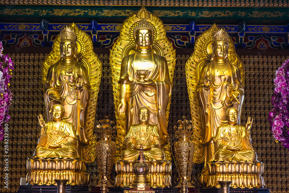 NONTABURI, THAILAND - APIRL01, 2018: Golden buddha statues in Wat Lengnoeiyi is Chinese temple in Thailand.