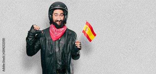motorbike rider with a spain flag