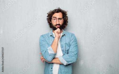 young tourist man confused or thinking
