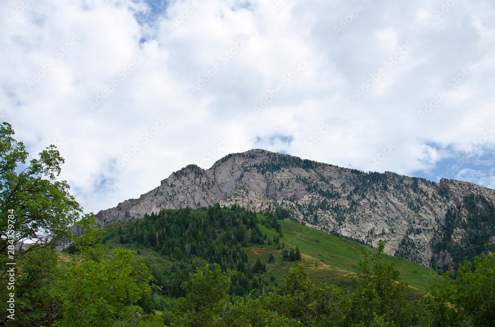 The rocky peak of the grand mountain olympus in the salt lake valley. 