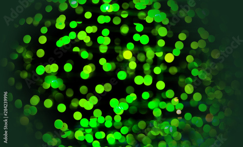 Photography of Christmas lights and ornaments on a Douglas fir tree.