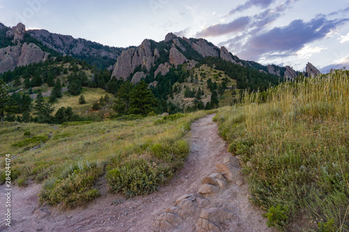 Warm summer sunset over hiking trail in Boulder Colorado