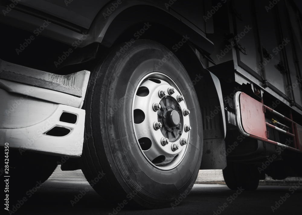 Front of truck wheels tires. Freight truck transport Front of truck wheels tires. Freight truck transport