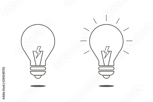Light bulb set. Turned off and glowing. Line art on white background.