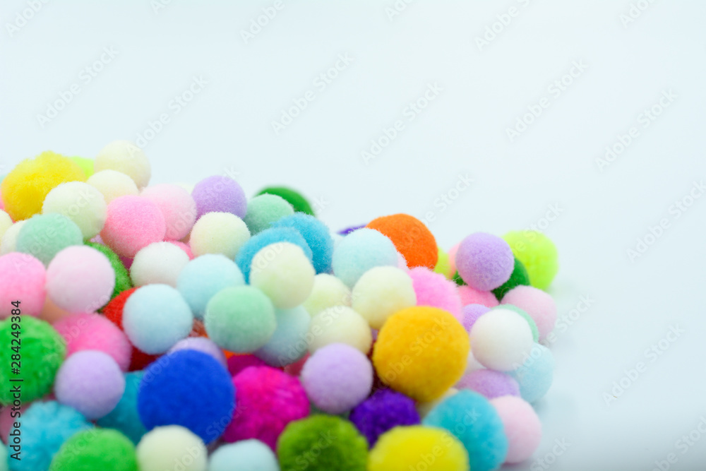 A colorful pom poms background A colorful pom poms background