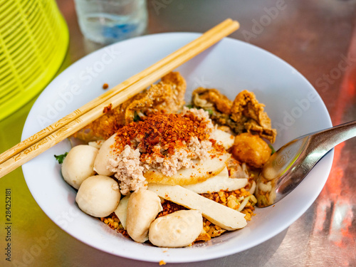 Noodle Tom Yam with fish meatball good tasty food,In restaurant at Market (Sampeng),Bangkok,Thailand,Food Thai