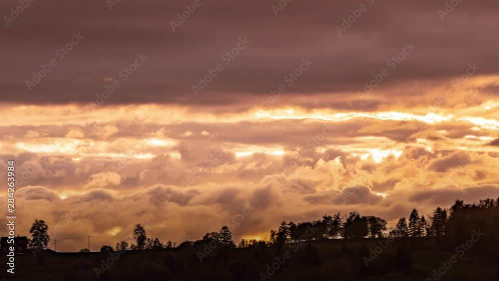 Clouds in the sunset. Close-up timelapse.
