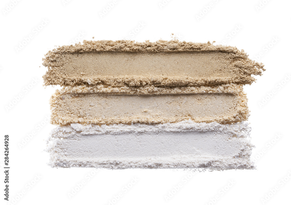 Fototapeta premium Broken eyeshadows in trendy shades isolated on white background