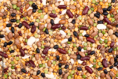 Legumes, lentils, chickpeas and beans assortment, top view